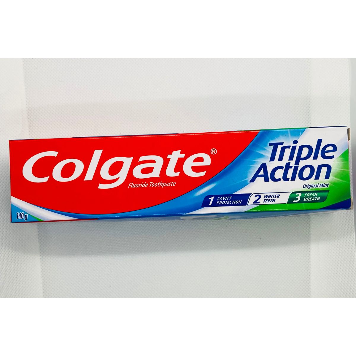 Pasta de dente Colgate Triple Action 140g 